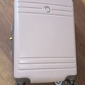 Delsey Paris Pink Hard Shell Suitcase with Wheels